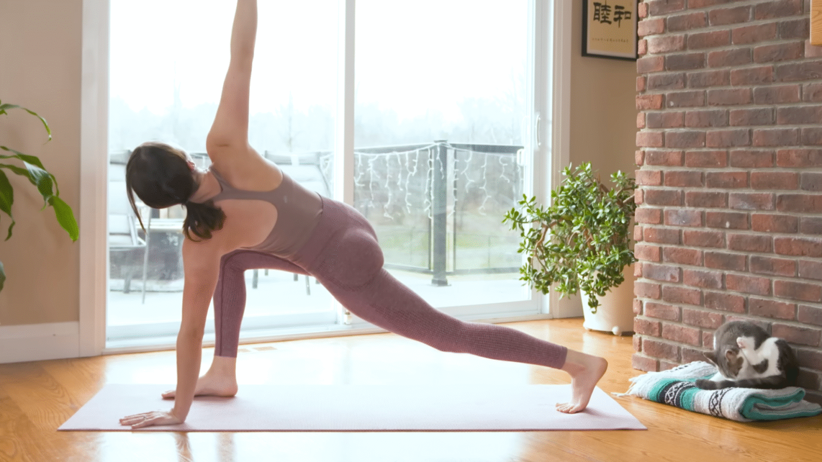 Woman in Revolved Lunge on a yoga mat