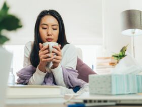 congested woman drinking tea