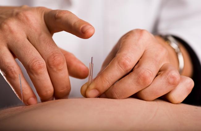 Acupuncture treatment improves disabling effects of chronic low back pain in older adults