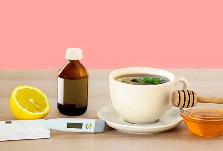 half a lemon, tissues, thermometer, cough syrup, hot tea, honey