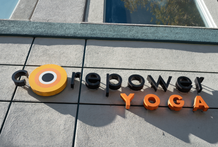 The CorePower Yoga logo on the side of a building