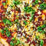 Halloumi, sundried tomato & caper pizzettes with rocket pesto