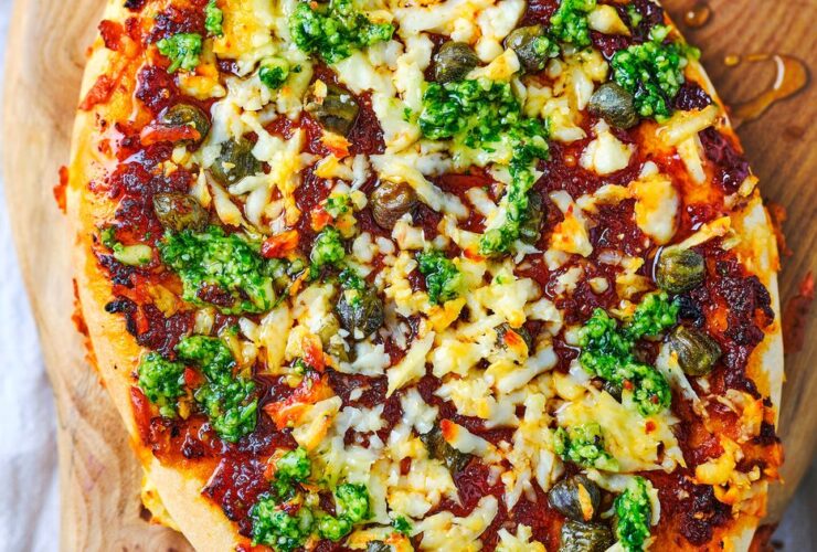 Halloumi, sundried tomato & caper pizzettes with rocket pesto