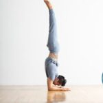 Man practicing forearm balance.