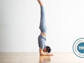 Man practicing forearm balance.