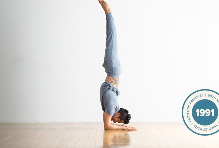 Man practicing forearm balance.