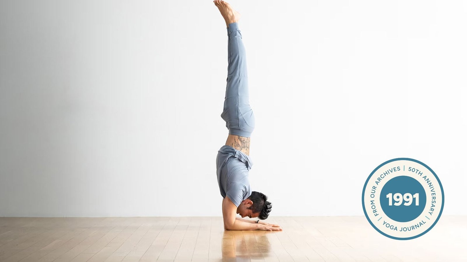 Man practicing forearm balance.
