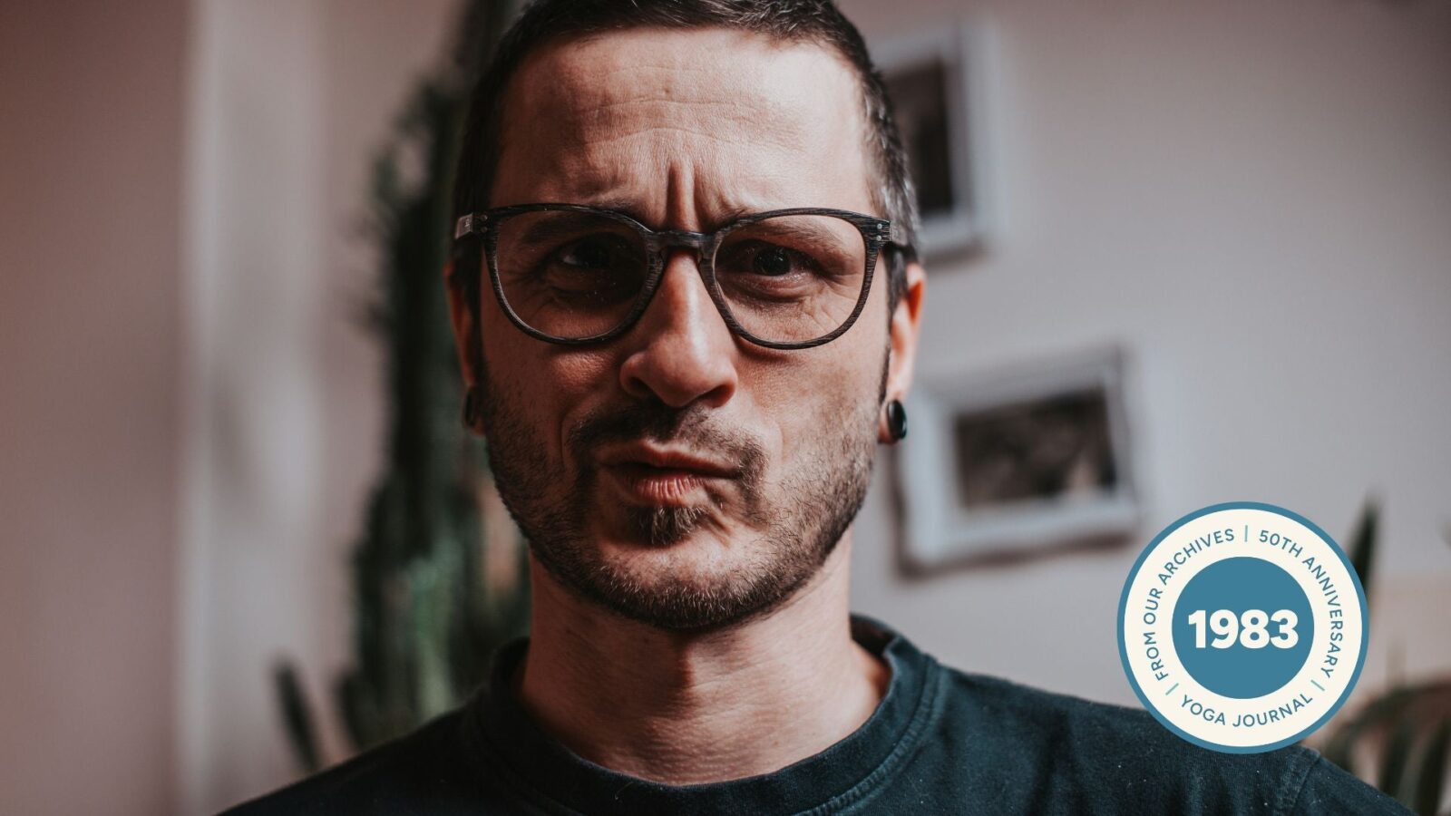 Close-up of man's face looking confused.