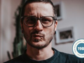 Close-up of man's face looking confused.