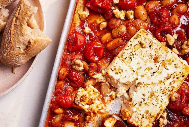Spiced baked feta with bean ragu & walnuts recipe