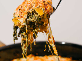 This Healthy-ish Artichoke Dip Keeps All The Creaminess, Just With More Veggies