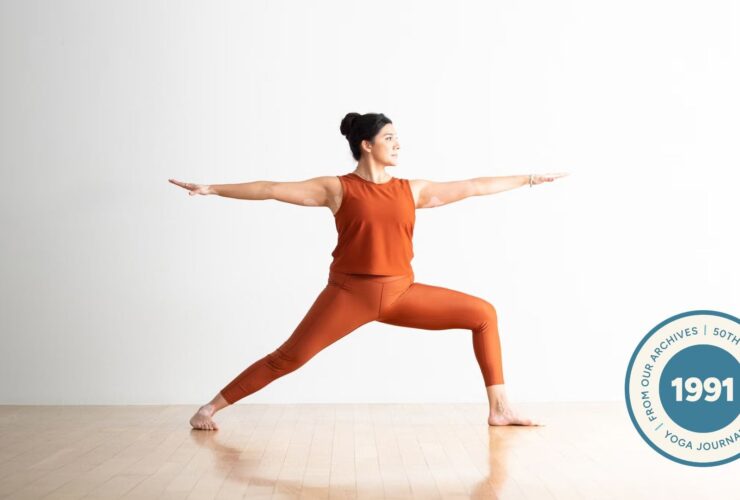 Woman practicing Warrior 2.