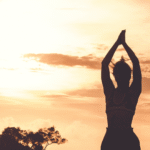 Woman outside at sunset