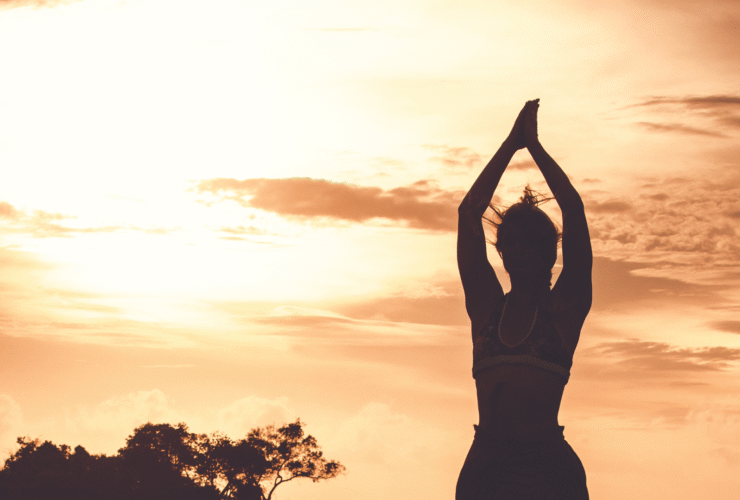 Woman outside at sunset