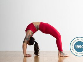 Person practicing Wheel Pose