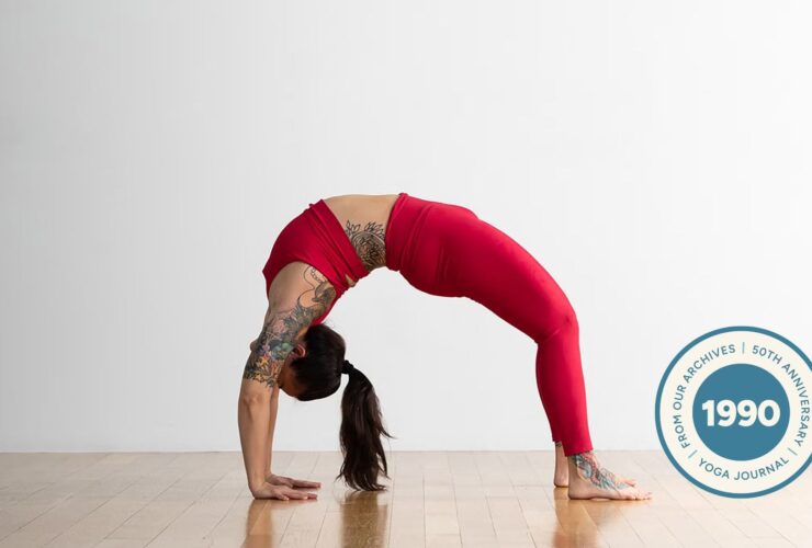 Person practicing Wheel Pose