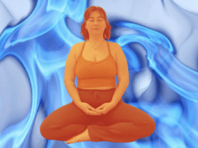 Yoga teacher Taylor Lorenz doing a breathing exercise against a background of blue flames