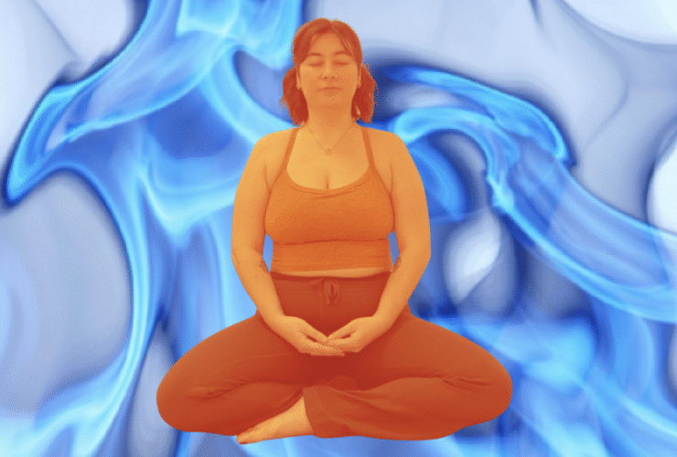 Yoga teacher Taylor Lorenz doing a breathing exercise against a background of blue flames
