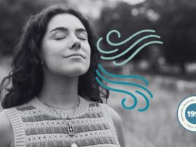 A woman breathing in and out