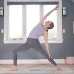 Woman standing in Reverse Warrior Pose