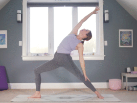 Woman standing in Reverse Warrior Pose