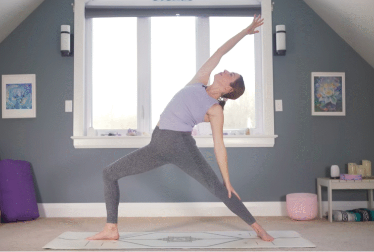 Woman standing in Reverse Warrior Pose