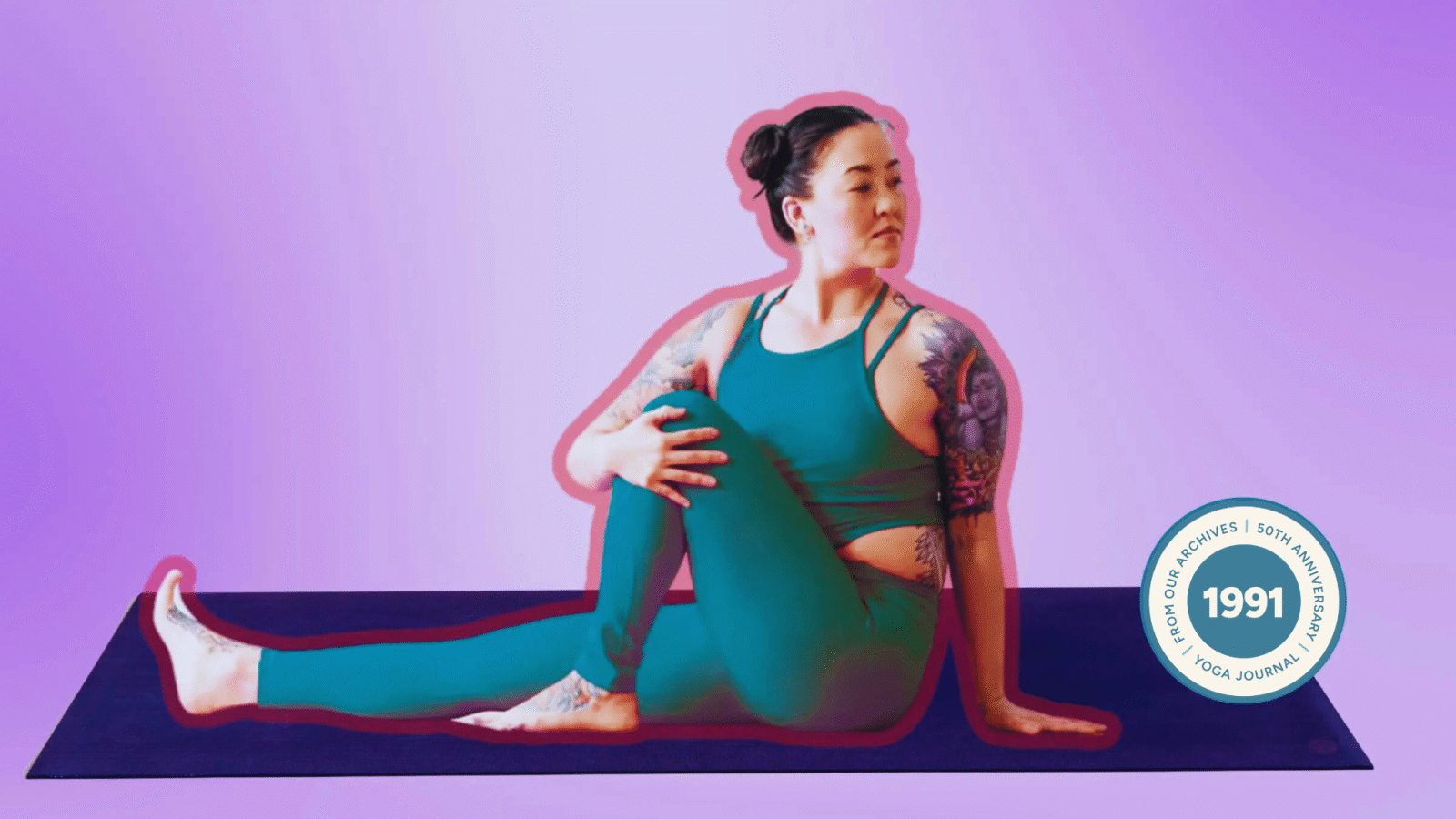 Woman practicing Marichyasana III