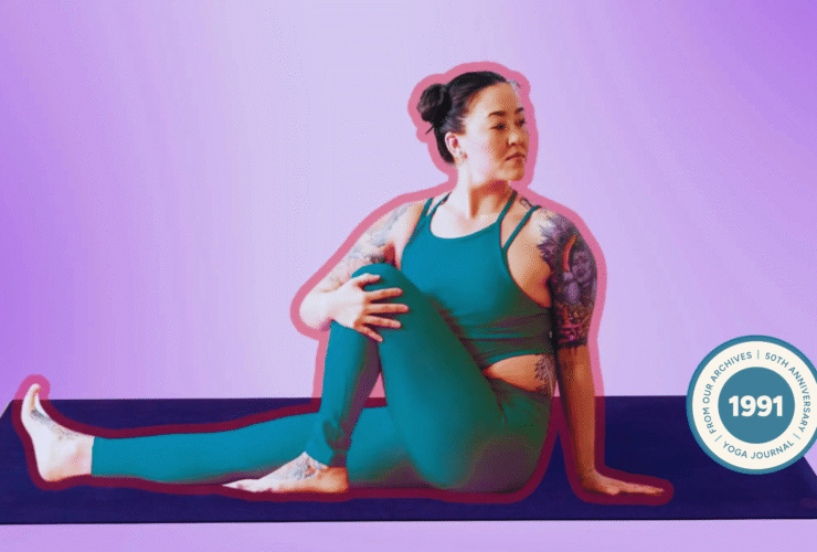 Woman practicing Marichyasana III