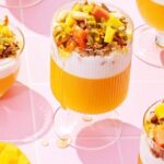 Tropical breakfast trifles with coconut granola