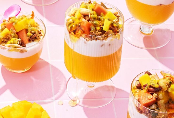 Tropical breakfast trifles with coconut granola