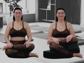 Teacher Taylor Lorenz in supported Firelog Pose against a yoga studio backdrop