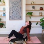 Caitlin K'eli practicing seated chest stretch.