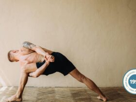 Man practicing Ashtanga yoga.