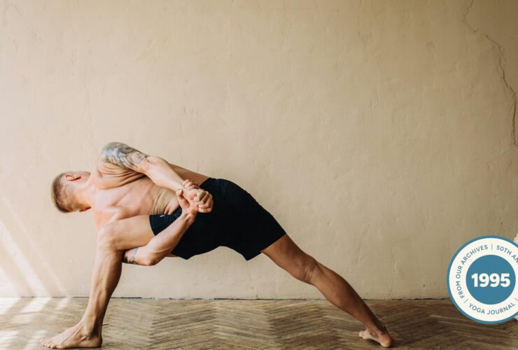 Man practicing Ashtanga yoga.