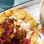 Lamb koftas with mango yoghurt sauce, flatbreads & pickles