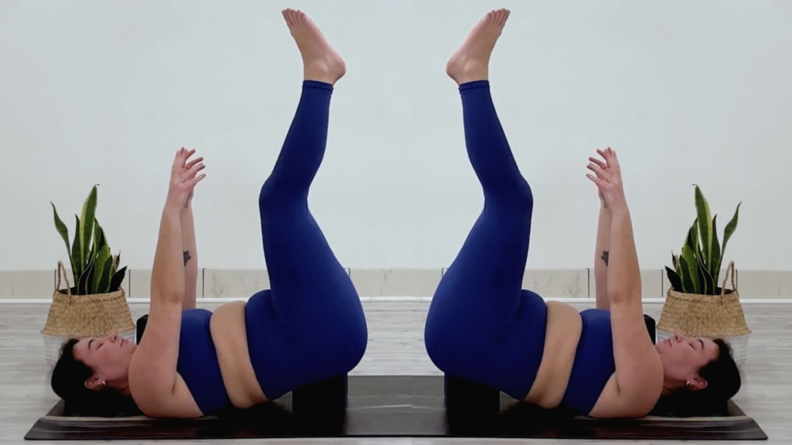 Yoga teacher Taylor Lorenz in Supported Waterfall, part of her yoga practice for when you're feeling overstimulated