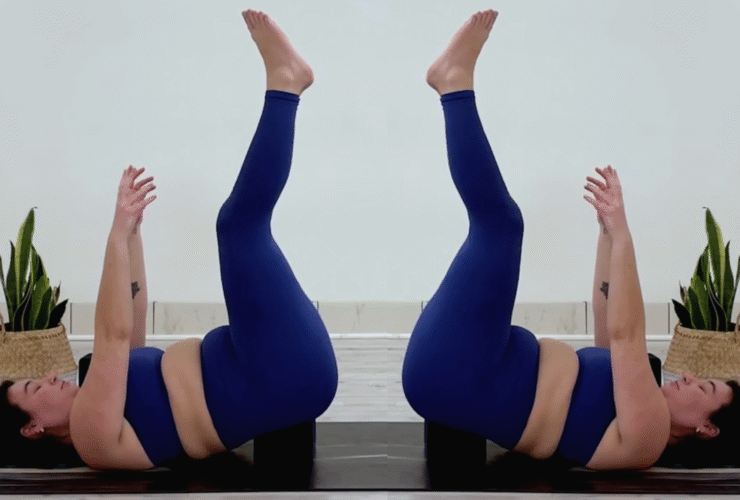 Yoga teacher Taylor Lorenz in Supported Waterfall, part of her yoga practice for when you're feeling overstimulated