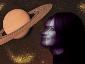 Woman staring at illustration of Saturn return.