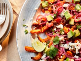 Black bean chilli fries with pickled red onion, feta & lime