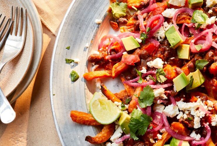 Black bean chilli fries with pickled red onion, feta & lime