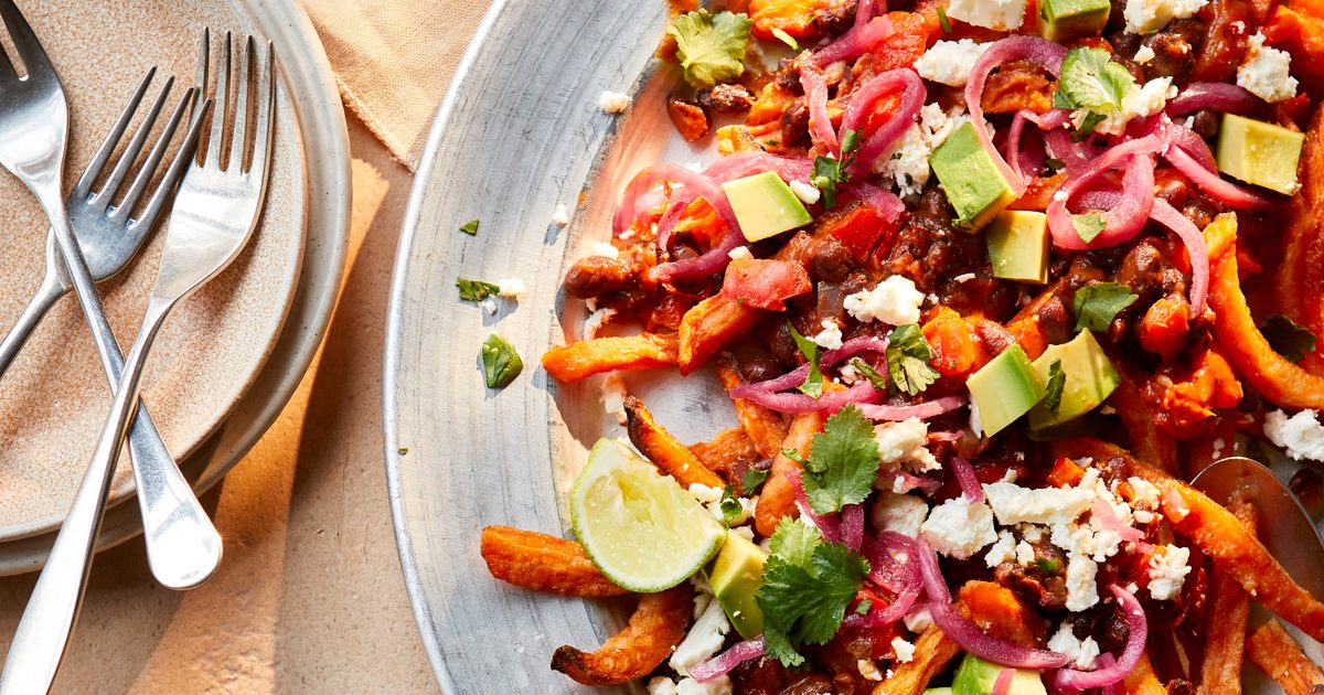 Black bean chilli fries with pickled red onion, feta & lime