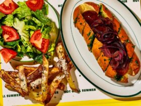 Garlic bread hot dog with cheesy rosemary & truffle fries